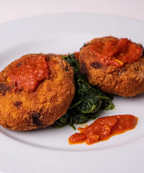 Polpette di bollito fritte con cicoria ripassata